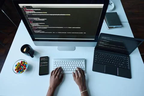 Developer working on computer at his workplace 写真素材