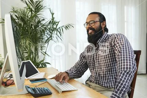 Developer working on computer at office Stock Photos
