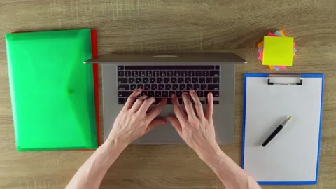 The developer is working with laptop. Modern workplace. Stock Footage 205469823