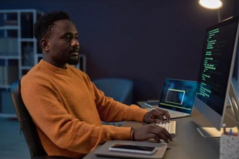 Developer working with security codes of program Stock Photos