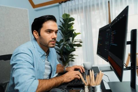 Developer working software development coding two computer code screen. Surmise. 스톡 사진