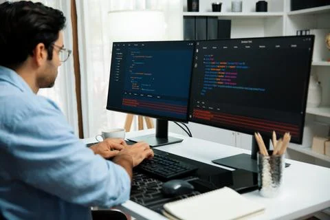 Developer working software development coding two computer code screen. Surmise. 스톡 사진