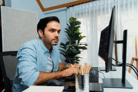 Developer working software development coding two computer code screen. Surmise. 스톡 사진