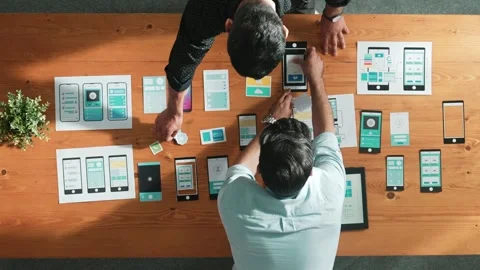 Developer working on Ux ui design while partner working together. Convocation. Stock Footage 271289521