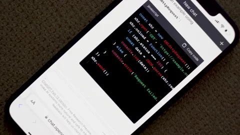 Developer writing code for an AI chatbot powered by GPT technology, using Vidéo 234874363