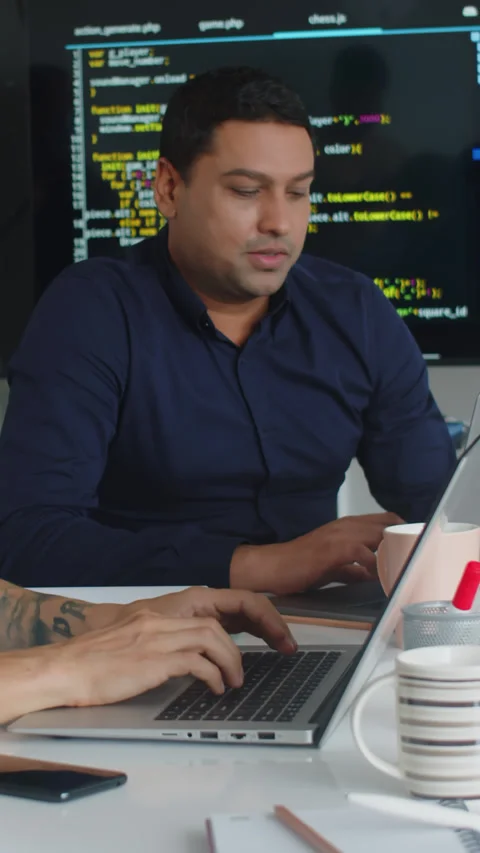 Developer Writing Programming Code on Laptop Stock Footage 263105284