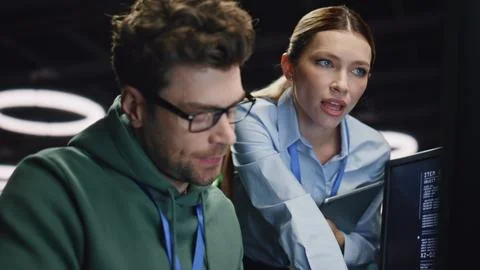 Developers brainstorm work look computer screen at office closeup. Team working Stock Photos