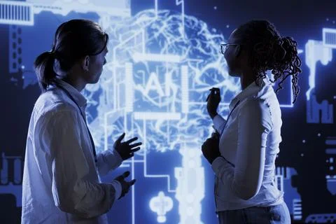 Developers brainstorming ways to use AI Foto stock