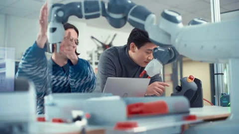 Developers Brainstorming While Coding Stock Footage 187575232