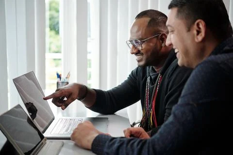 Developers Checking Programing Code 库存照片