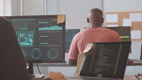 Developers Collaborating on PCB Design in Modern Office Stock Footage 321663849