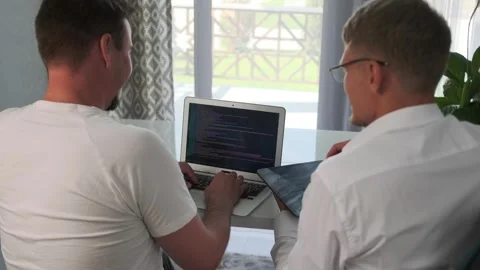Developers discuss code improvements and optimizations. Video stock 294298856