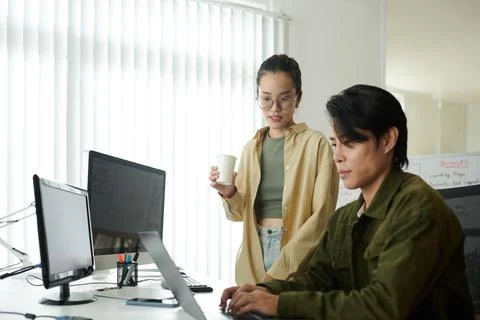 Developers Fixing Bugs Stock Photos