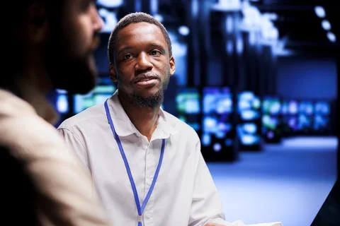 Developers fixing server system failures Stock Photos