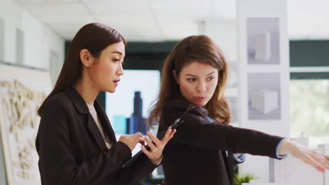 Developers measuring 3d building model to create blueprints Stock Footage 262996756