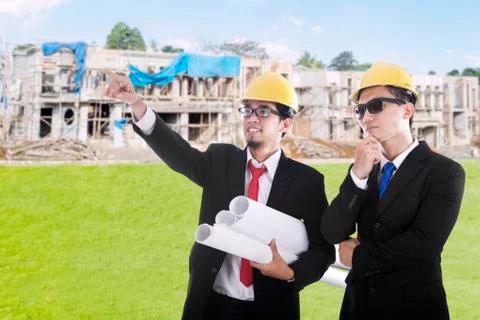 Developers meeting at the construction site Stock Photos