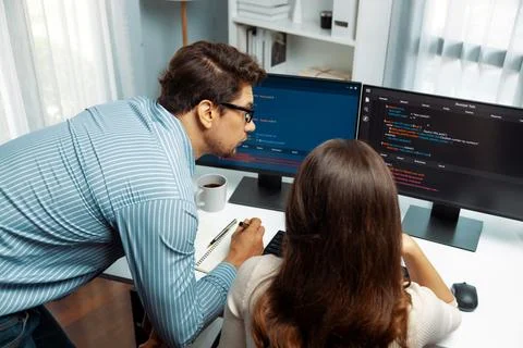 Developers program coding discussing website planning software. Postulate. Stockfoto's