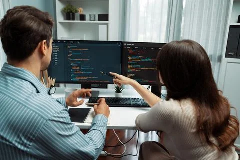 Developers program coding discussing website planning software. Postulate. Stock Photos