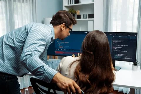 Developers program coding discussing website planning software. Postulate. 写真素材