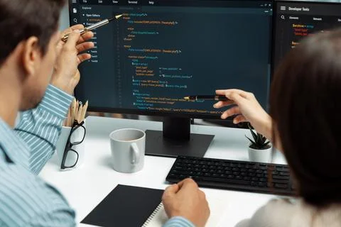 Developers program coding discussing website planning software. Postulate. Stockfoto's