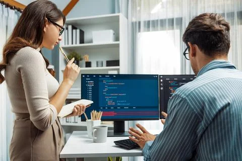 Developers program coding discussing website planning software. Postulate. Stockfoto's