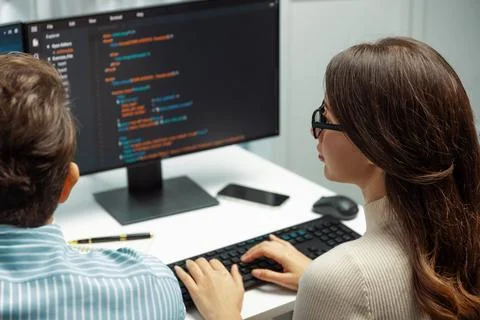 Developers program coding discussing website planning software. Postulate. Foto stock