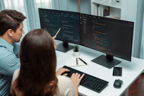 Developers program coding discussing website planning software. Postulate. Stock Photos