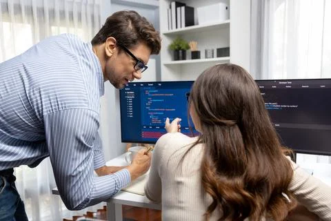 Developers program coding discussing website planning software. Postulate. Stock Photos