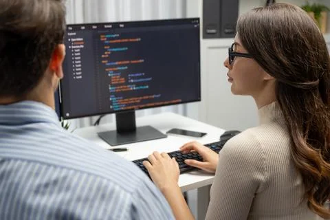 Developers program coding discussing website planning software. Postulate. Foto stock