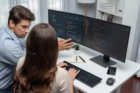 Developers program coding discussing website planning software. Postulate. Stock Photos