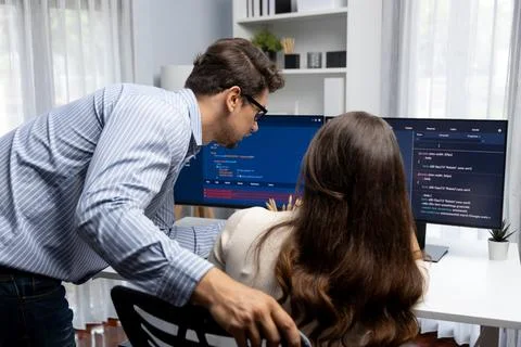 Developers program coding discussing website planning software. Postulate. Stockfoto's