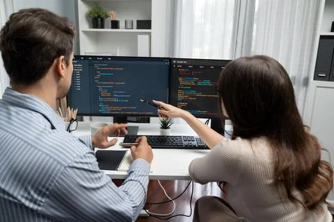 Developers program coding discussing website planning software. Postulate. Stock Photos