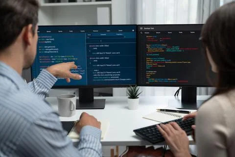 Developers program coding discussing website planning software. Postulate. Stock Photos