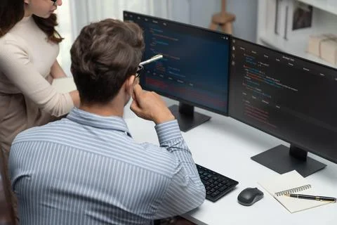 Developers program coding discussing website planning software. Postulate. Stock Photos