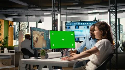 Developers team planning construction with software tools and green screen Stock Photos