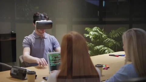Developers testing VR simulation in office Stock Footage 142062719