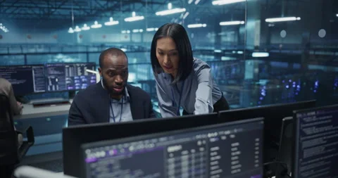 Developers Working on Computers in Data Center Office Stock Footage 296174245