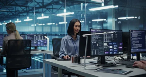 Developers Working on Computers in Data Center Office Stock Footage 296174428