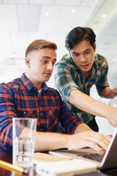 Developers working on mobile app Stock Photos