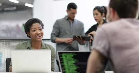 Developers working in an office Video stock 86814386