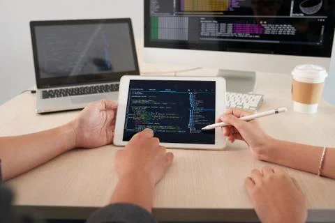 Developers working over new application Stock Photos