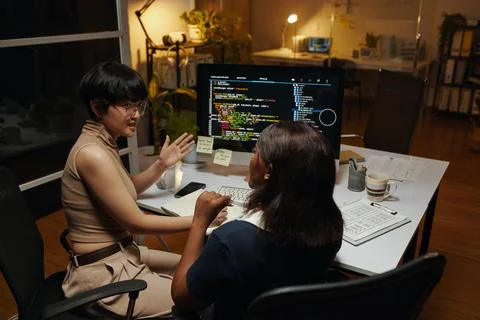 Developers Working on Product Update Stock Photos