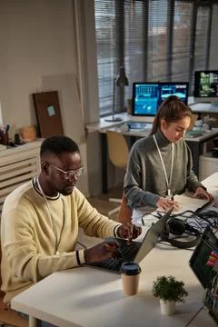 Developers Working in Small Office Stock Photos