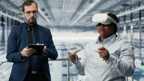 Developing advanced electronics, VR glasses gear and microchip factory managers Stock Footage 333387525
