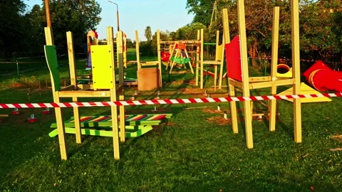 Developing a children's play area with wooden structures, foundations, and Stock Footage 327830579