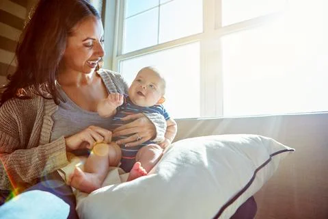 Developing a deep, everlasting bond. a young woman bonding with her baby boy on Foto stock