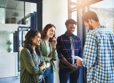 Developing ideas as a team. a group of colleagues having an office meeting. Stock Photos