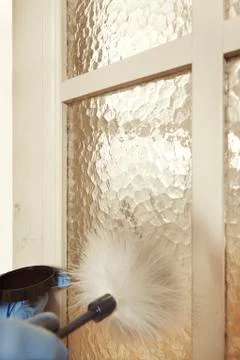 Developing on latent fingerprint with feather brush on interior door Stock Photos