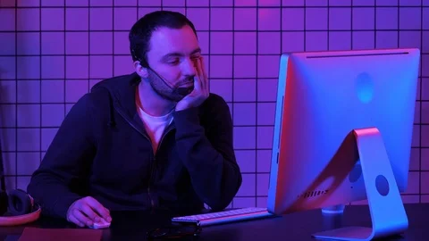 Developing programming and coding technologies. Bored programmer working. Stock Footage 103548466