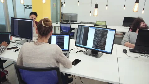 Developing programming and coding technologies. Programmer working in a softw Stock Footage 236876347